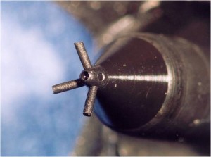 Microset replica of a diesel engine injector nozzle (X20)